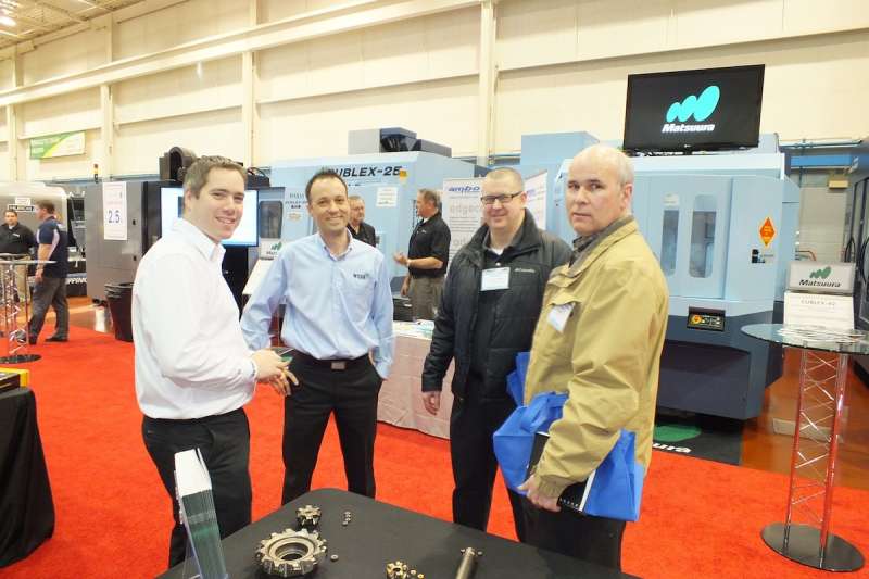 From left: Robert Badertscher and Ron Damad, Kennametal, and Russel McKinnon and Jim Syme from Husky Injection Molding Systems