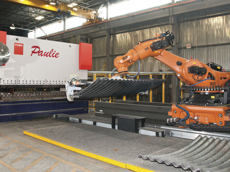 One challenging aspect of programming the robotic bending cell was how the robot handled and supported the corrugated culvert as the radius work was being performed on the second Bystronic press brake.
