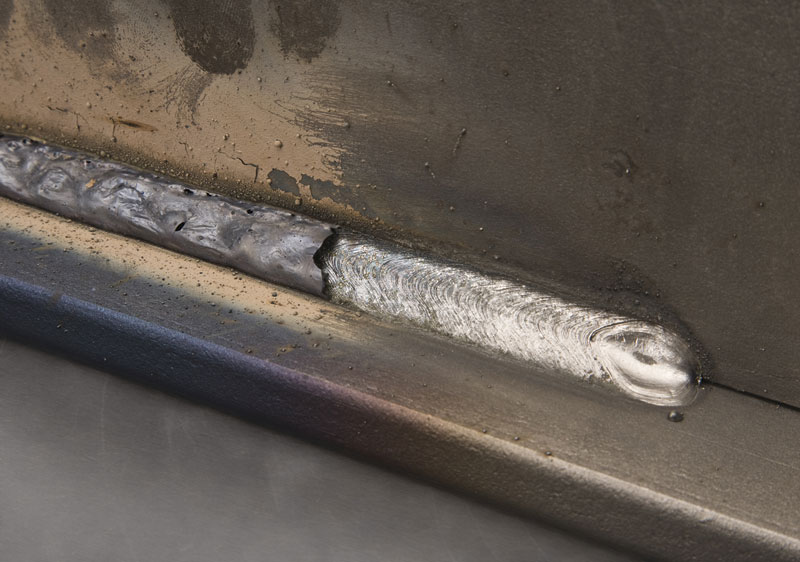 A stick weld with some of the overlying slag chipped away reveals a good weld underneath.