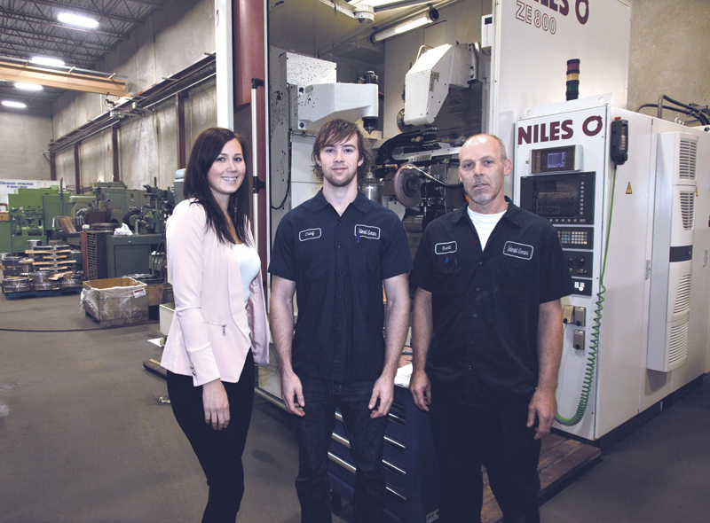 Zoe Ahnert, left, beside her brother Alexander, middle, with their uncle, Brett Ahnert, gear shop manager.