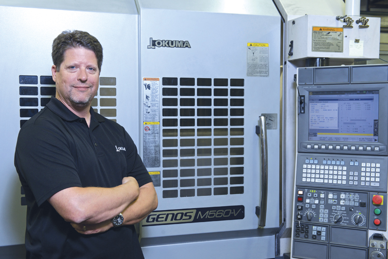 Frank Klomp says his machinists enjoy the ease of programming and operation of the Okuma machines in his shop. After a brief experience with a non-Okuma machine, his most recent purchase was the Okuma Genos VMC, seen here with Klomp. 