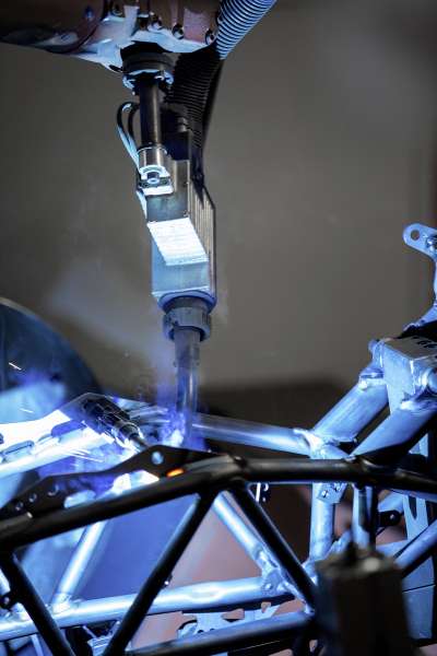 98% of the seams of a WP motorbike frame are welded by robots.