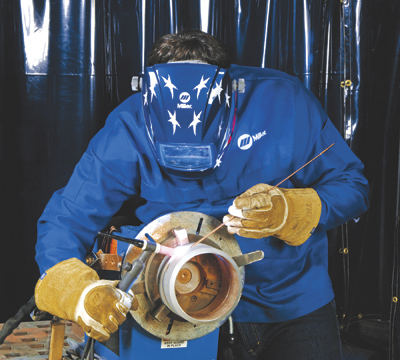 TIG welding is usually performed manually. Seen here is a Miller pipe welding application.