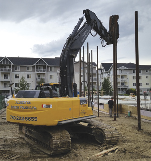 Installation of one of the screw piles Alberta Screw Piles fabricates. They're installed all over Western Canada.