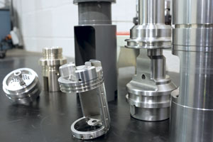 Examples of the challenging workpieces Elite Machining makes every day in its shop.  