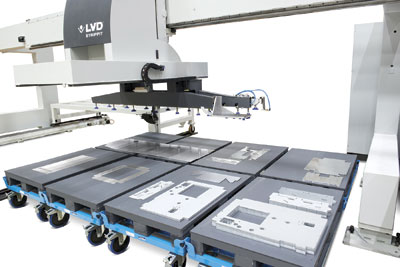 An example of LVD Strippit's flexible automation system offers advanced load/unload, part picking and an area for stacking parts on pallets.