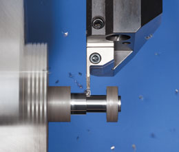 Tungaloy’s TungCut illustrates that good chip control is important when groove-turning behind shoulders and other areas where long, stringy chips can wrap around the workpiece.  Image: Tungaloy