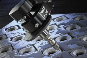 Waterjet cutting systems offer among the most flexibility when it comes to cutting a wide range of materials, say suppliers. Seen here is OMAX's A-Jet tilting head for cuting more complex parts.