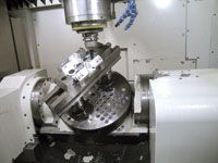Unilock riser bases and a rail vise in a trunnion style five axis machine IMAGE: BIG Kaiser