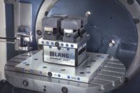 Lang-Technik’s Quick-Point plates allow multiple parts and high density workholding to be loaded outside the machine tool then dropped in place quickly. IMAGE: Machine Tool Solutions