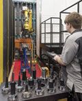 The Fanuc R-2000 robot carries tools from “the hive," consisting of 4,000 tools, to whatever Mazak Integrex machine calls for them. Their location and relevant information is stored in real-time in a central database.