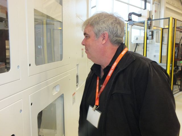 John O'Brien of Rice Tool & Manufacturing checks out automation on a Mazak machine
