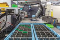 One of APN's "cobots" from Universal Robots tending one of the Index CNC machines.