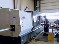 One of Drilling Tools International’s machinists, setting up the company’s ST-55 CNC lathe from Haas Automation. Image: Drilling Tools International