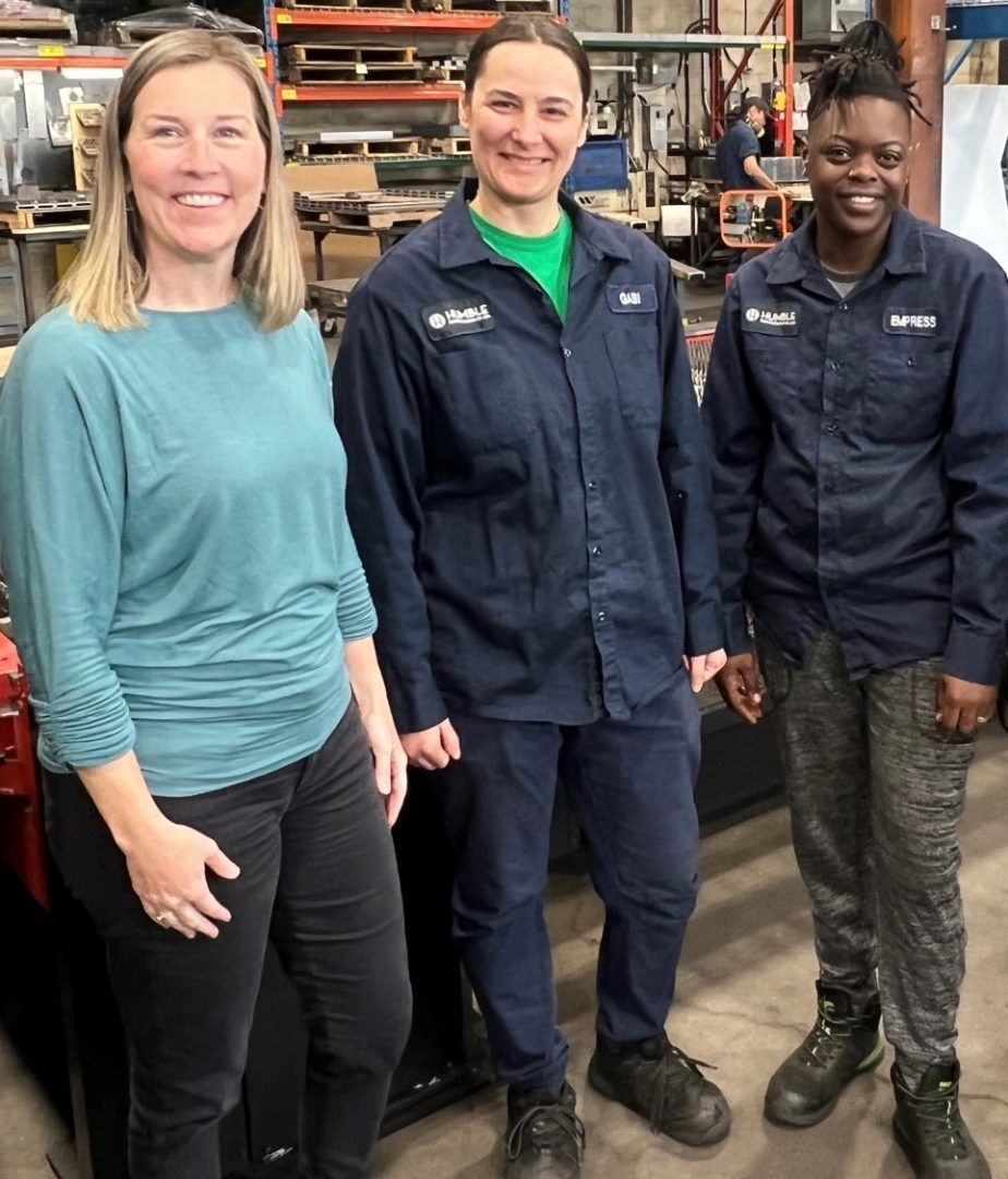 Tracy Spear (left) with Gabriela Spinu, Lead Hand, and Empress Mark - Sheet Metal Fabricator